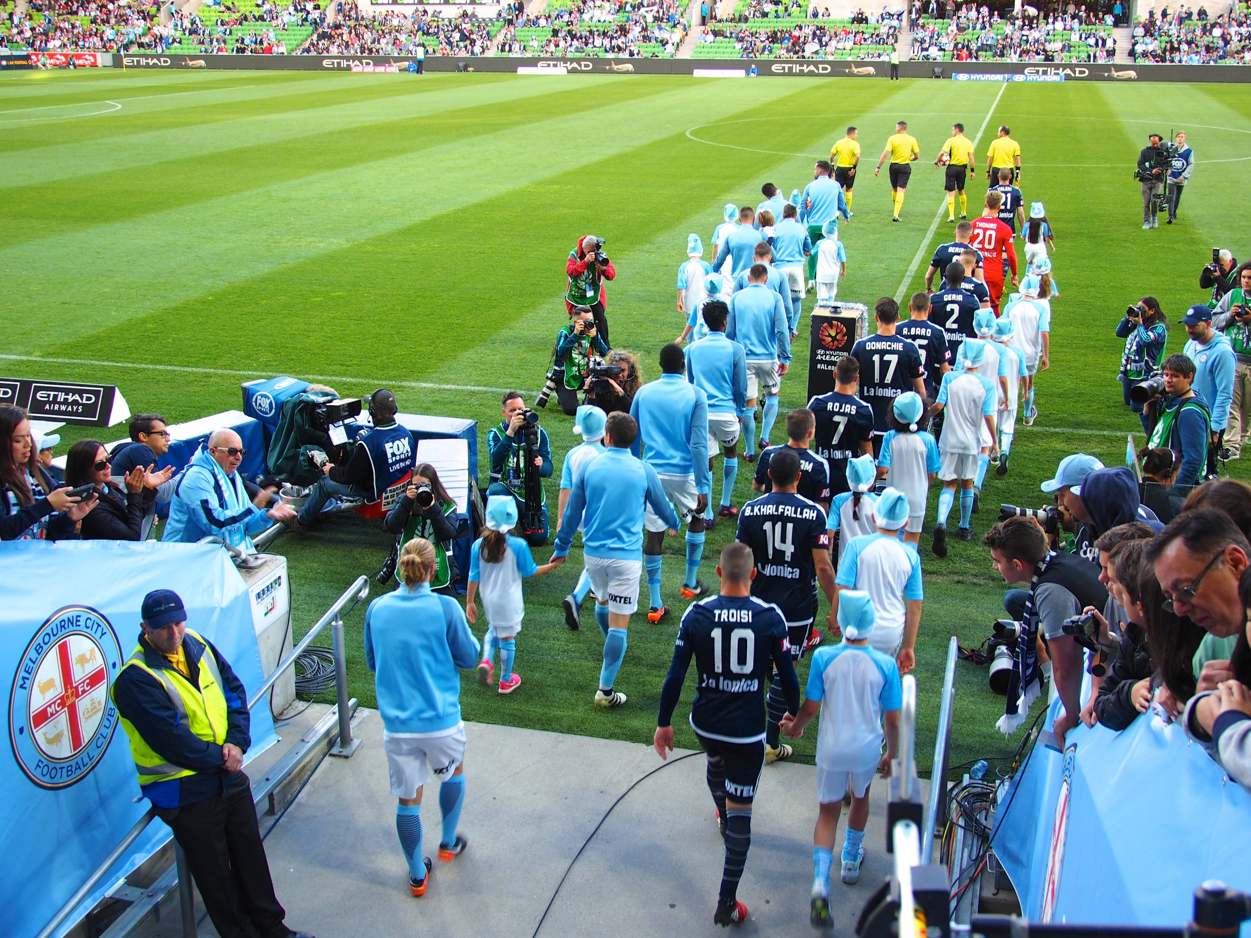Collingwood kids enjoyed being team mascots for Melbourne City and Melbourne Victory at the start of the match
