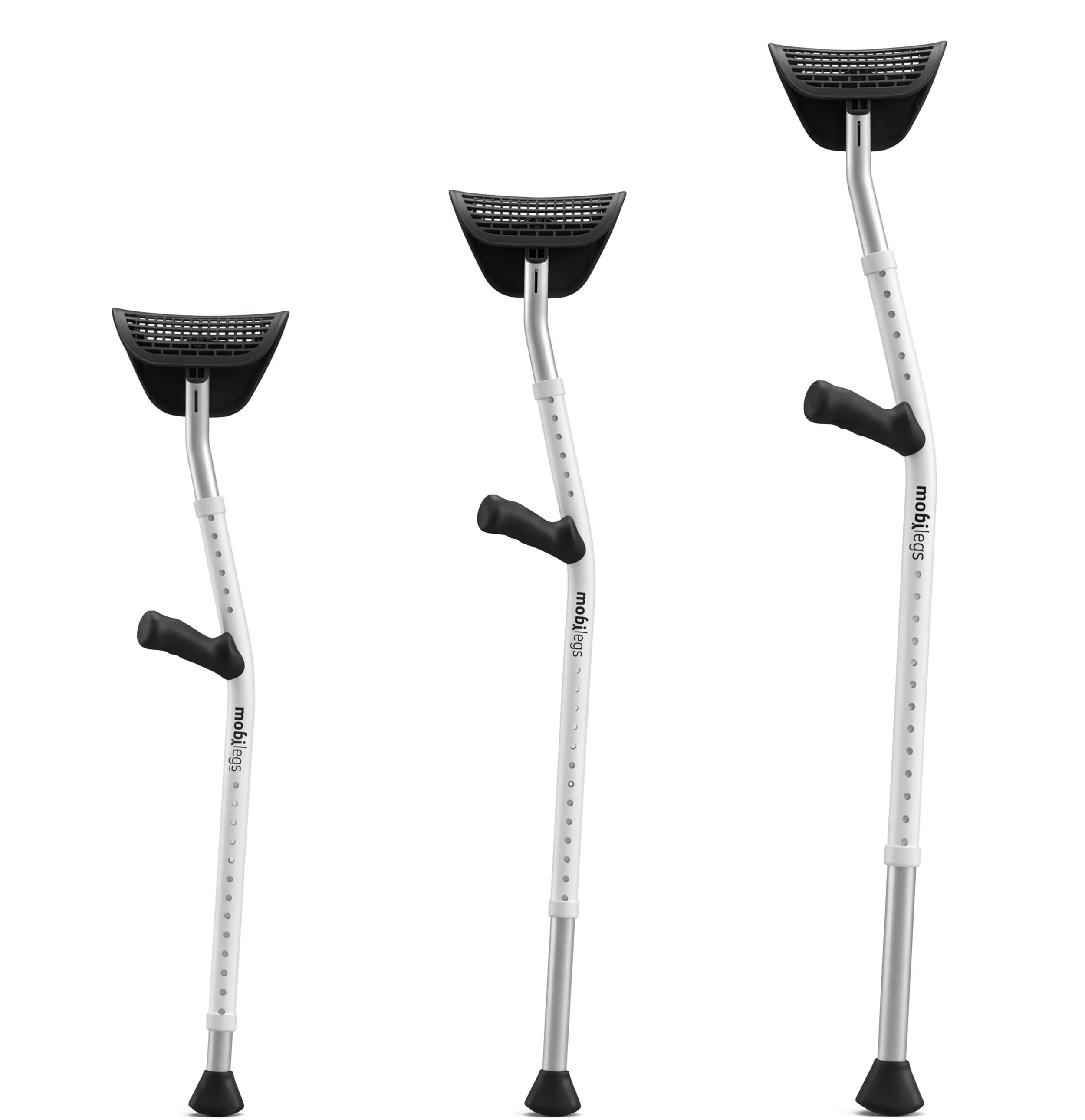 Three adjustable white crutches with black rubber grips and tips, positioned side by side.