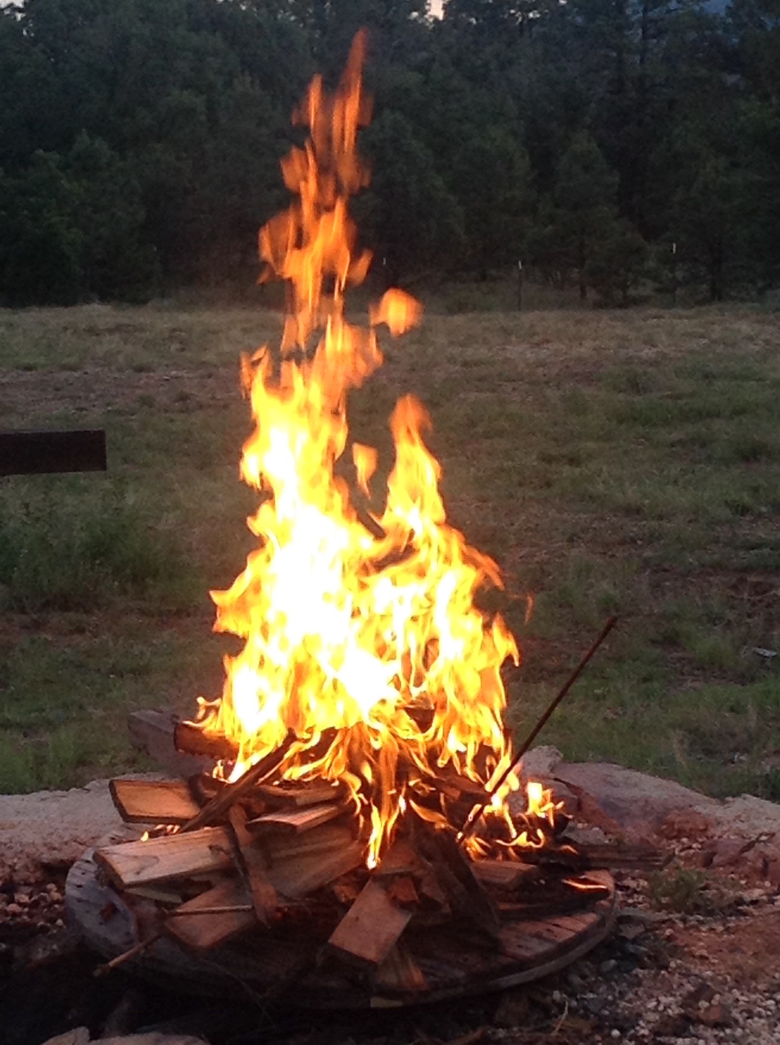 Evenings include campfire time and optional open studio work sessions.