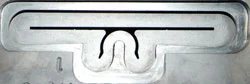 3" thick solid steel extrusion die precisely shapes these rigid high performance extrusions