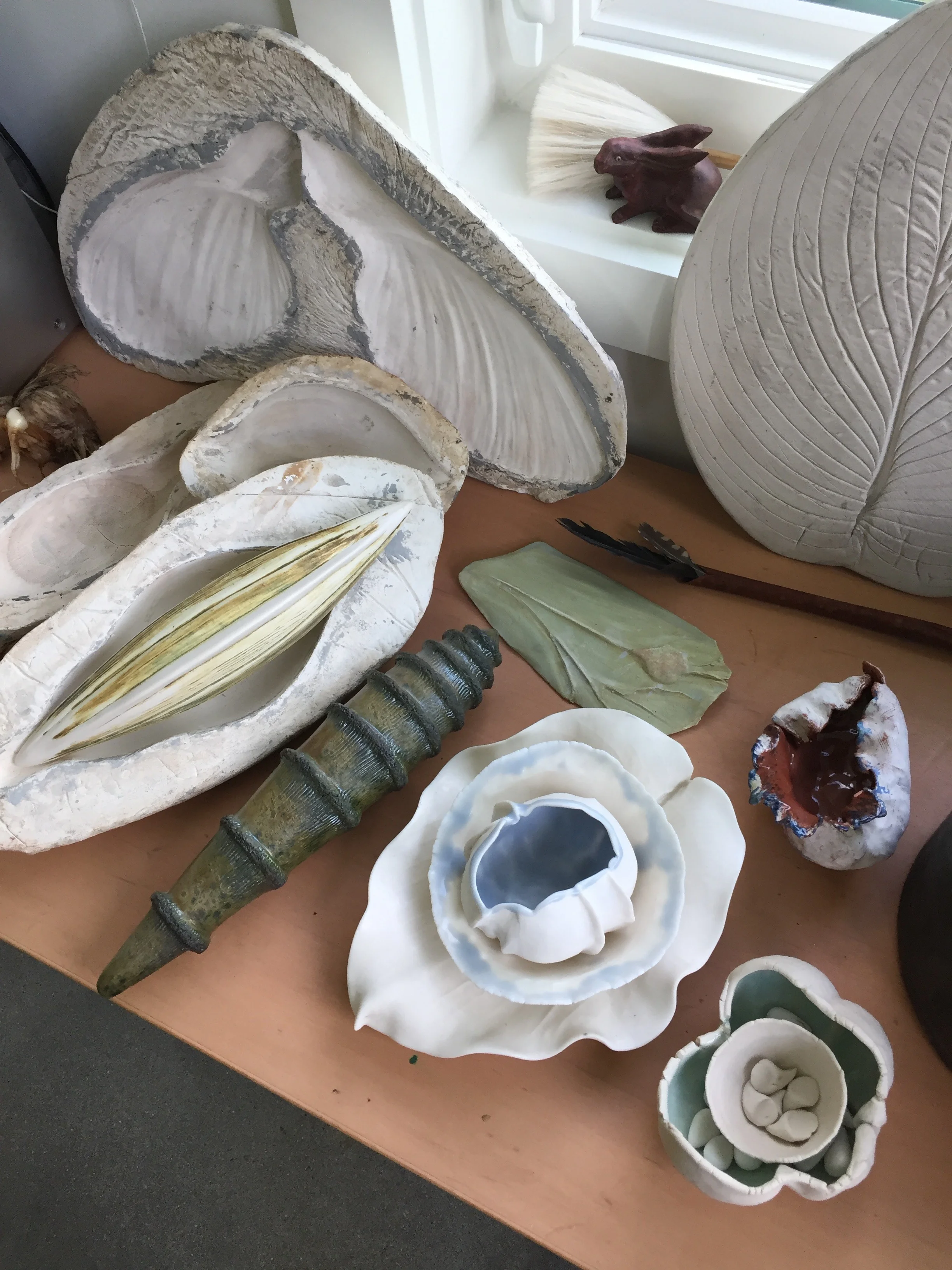 I AM EXCITED ABOUT OFFERING 2 DAY WORKSHOPS IN MY NEW STUDIO FOR only 4 TO 5 PEOPLE 3 two day workshops will be offered between Sunday, December 1, 2019 – Tuesday, December 17, 2019 12:00pm I have had so many requests for small workshops that I have decided it was time to offer them in my new studio in Clover, SC. To begin my little adventure I plan to offer 3 mini 2 day workshops. The dates that are open will be any pair of days between December 1 and the 17th , The specific dates will be determined by you! So on a 1st come, 1st serve basis you can tell me which workshop you want and which dates. I will fill the 2 day slots this way to include up to three 2 day workshops. Hoping this will help for the first go round until I can establish which pair of days are the most popular ! Choose one of these fun but productive 2 day workshops…..Keep in mind no experience is required for any of these mini workshops but I do highly recommend A Conversation with Clay as the very best one for beginners. I. A Conversation with Clay - Creating pinched forms in response to nature. Day two terra sigillata or underglaze may be applied to your work and meditation bowls may be glazed on the inside and ready to fire in a one fire process later. No firing will be offered but careful firing instructions will be given. II. Making forms using the “dowel method” of hand building - This method is perfect for small and large forms. Forms range from lovely cups or containers to making parts for a tree, human or animal forms. It is one of my favorite techniques…. III. Learn to make a small plaster press mold on day 1 - Day 2 we will begin some forms in clay to take home with you. I use press molds all the time. These are simple forms that can be easily used to create an assortment of related forms using the same mold. We have a lovely B&B here in Clover that is 5 minutes away and offers breakfast for $90. The sooner you register, the more likely you can get in to the B&B. The total cost for the workshop is $250 which includes all tools and materials. Refunds of $200 will be given with 2 weeks notice. $50 is non refundable… The first person or group (Yes, you can put own group together or start a group) that calls will have their choice of dates. I am open to longer workshops in the future but am still resolving a kiln issue. I am firing in my small kiln temporarily…. Hope to see some of you from past workshops for this new adventure! Call, email or text to hold a spot! 864-414-0478, aliceballard64@gmail.com