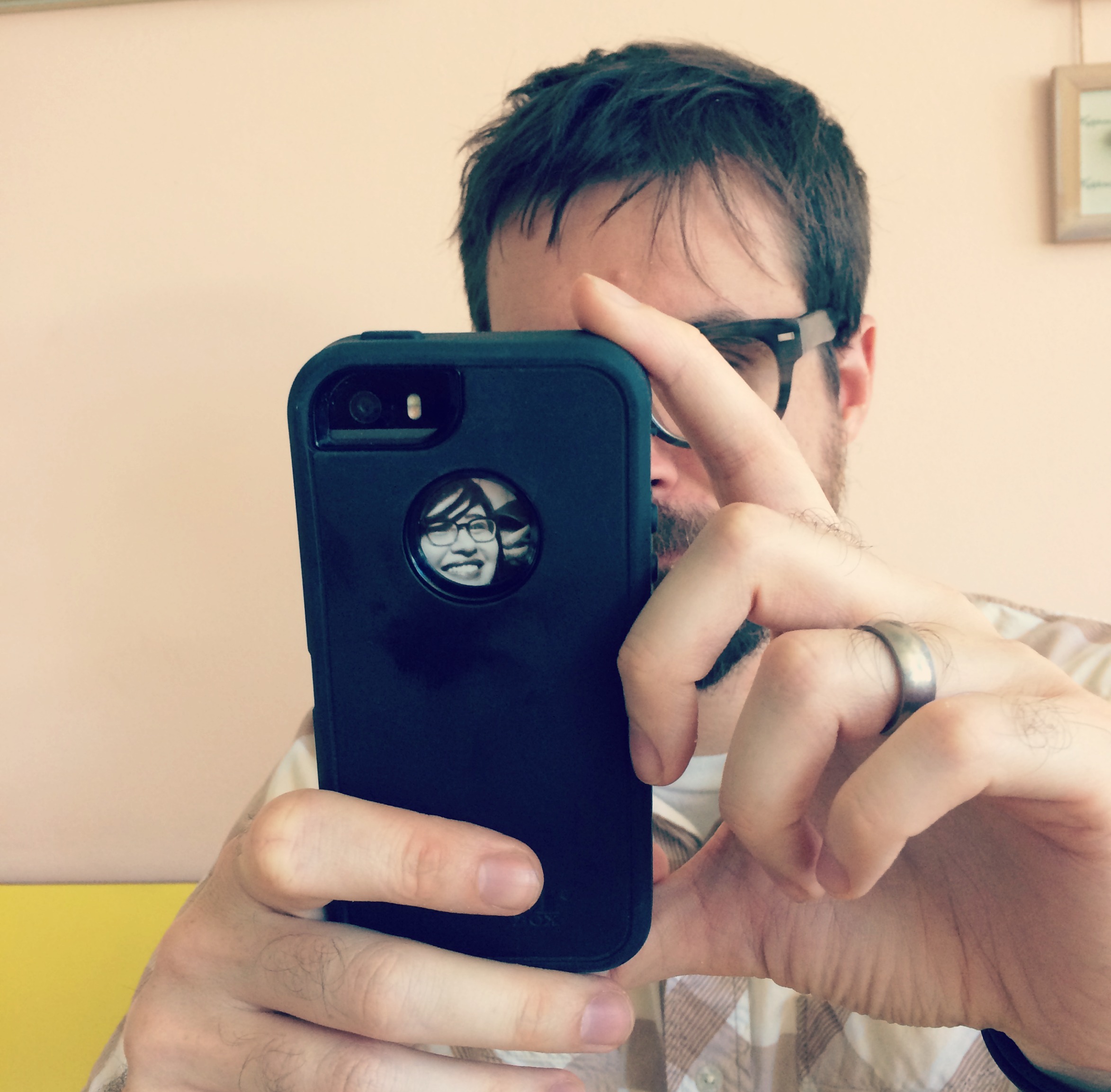 I cut our photo booth pics from the Ace Hotel. I put a few of them in an acrylic frame , and Scott put the other in his phone case. It's the little things, you know? 