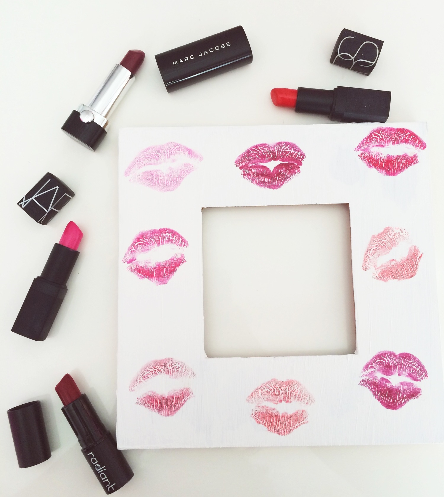 I have so many projects bookmarked in Happy Homemade Home book, I finished my first one. I made a frame for my vanity and used my favorite lipsticks. Go to page 234 in the book to find out how to seal it! Lipsticks pictured: NARS Schiap and HeatWave, Marc Jacobs Beauty in Cabaret , Radiant Lipstick (now defunct). 