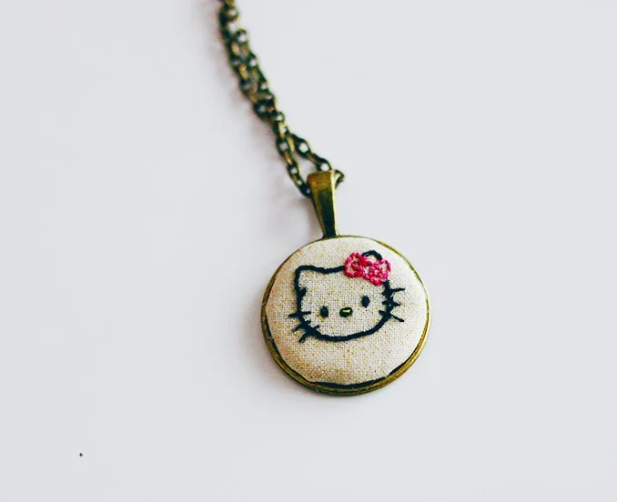 Ruthie sent me an amazing embroidered handmade necklace with my favorite cat on it. Thank you, Ruthie! Get your own from her shop . 