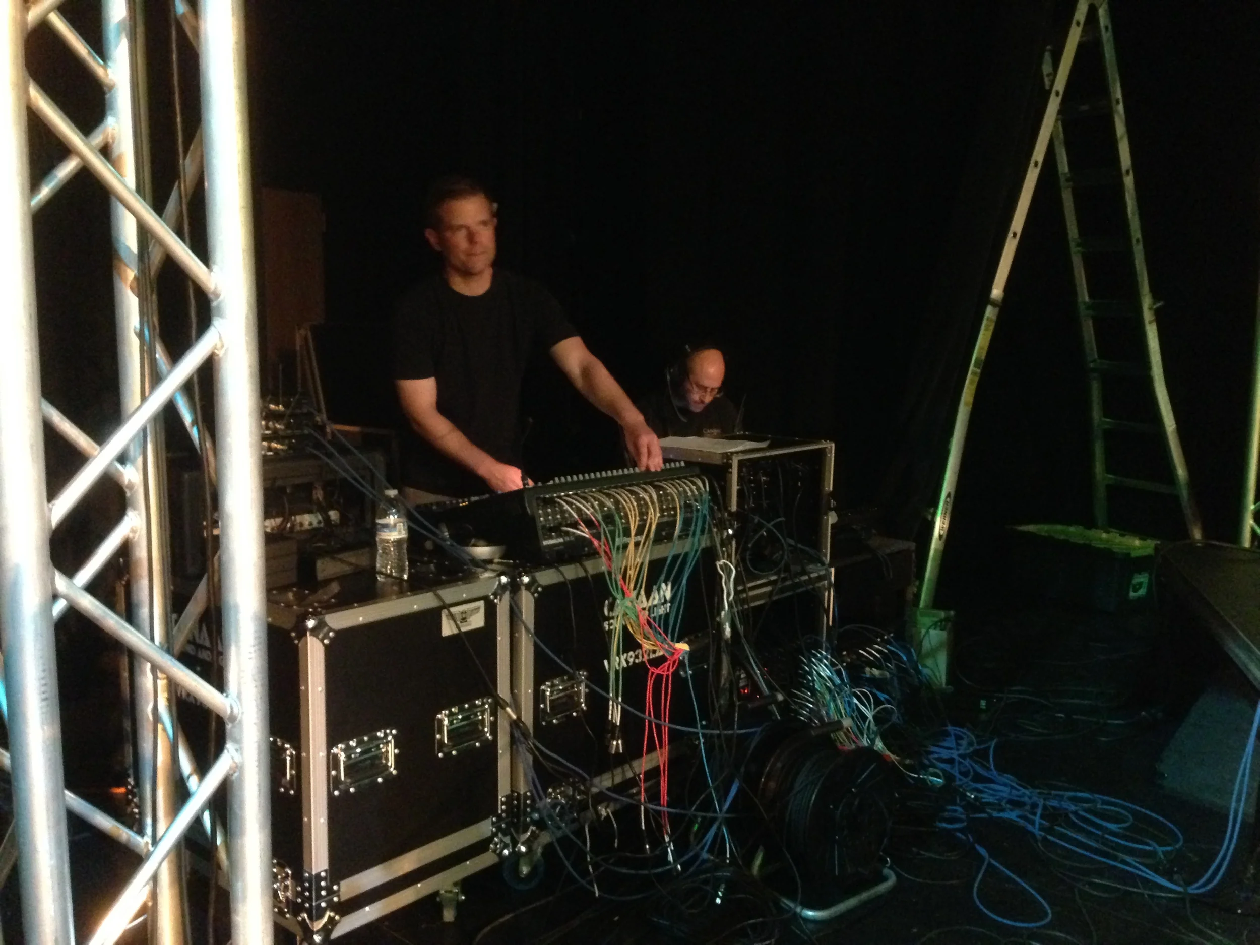 Dan on their PreSonus mixing monitors. Mike on the lighting controller.