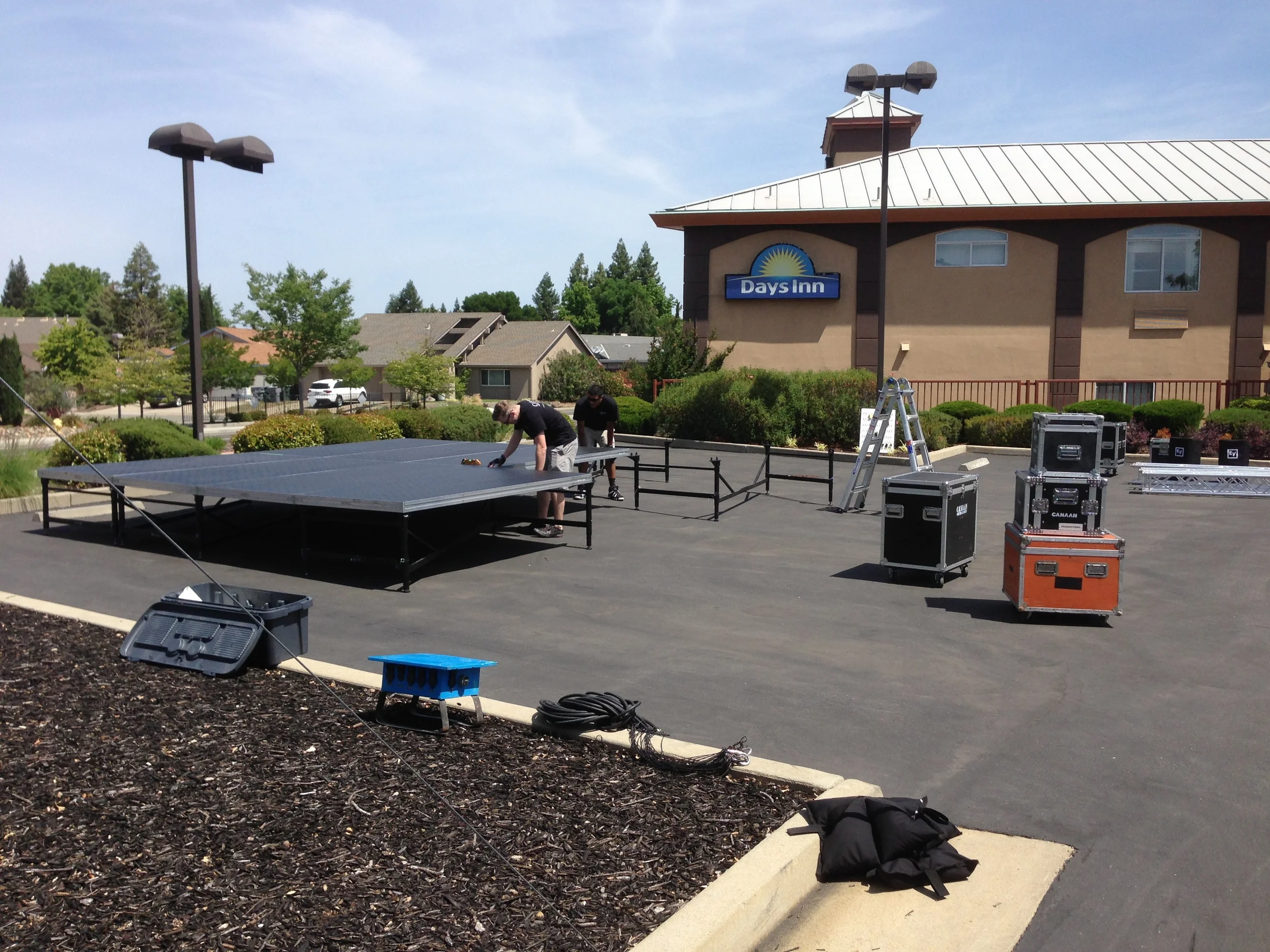 It took nearly an hour just to level the stage on this slanted parking lot