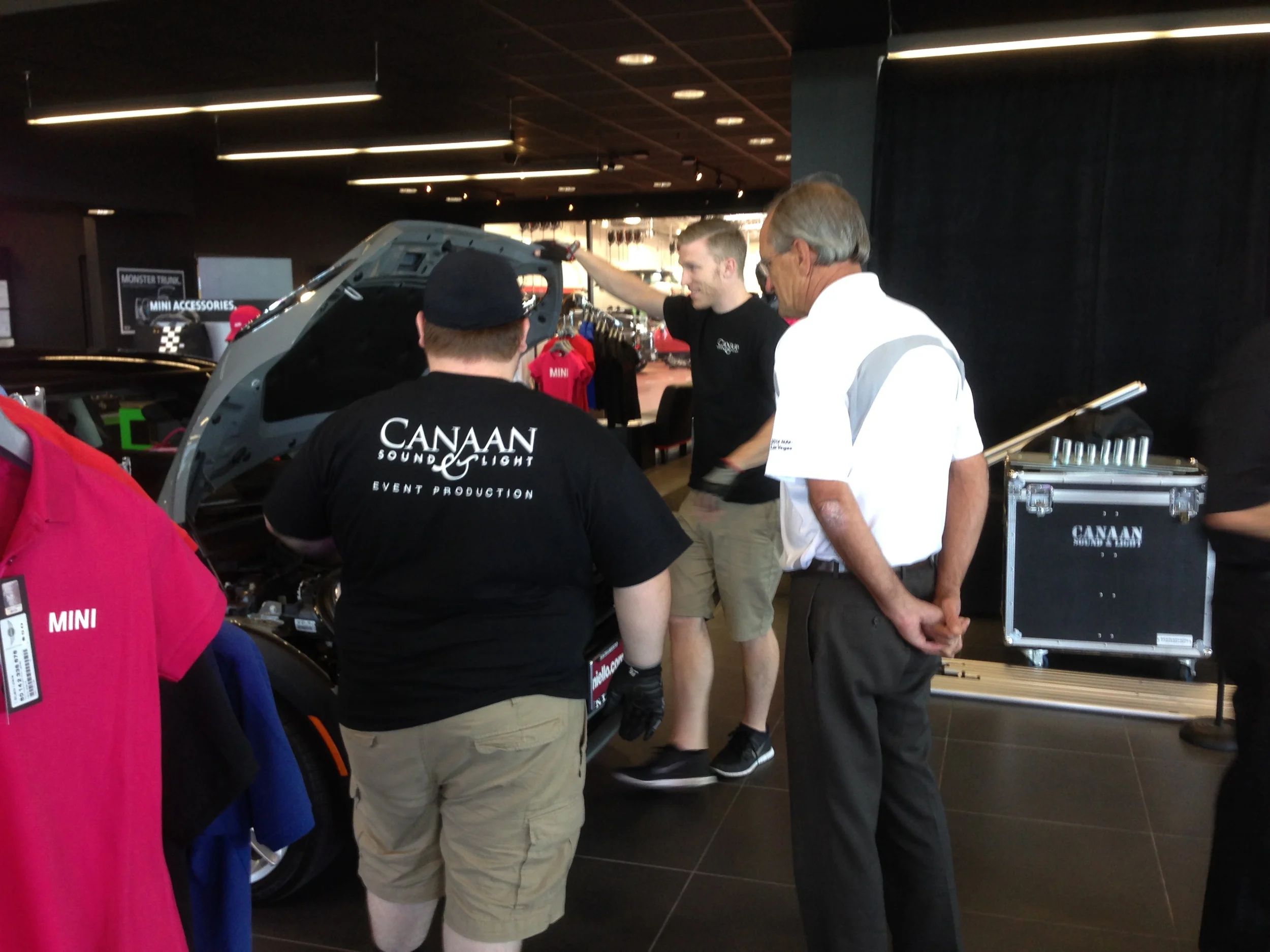 Hans giving Ryan and Chris a tour of the new MINI.