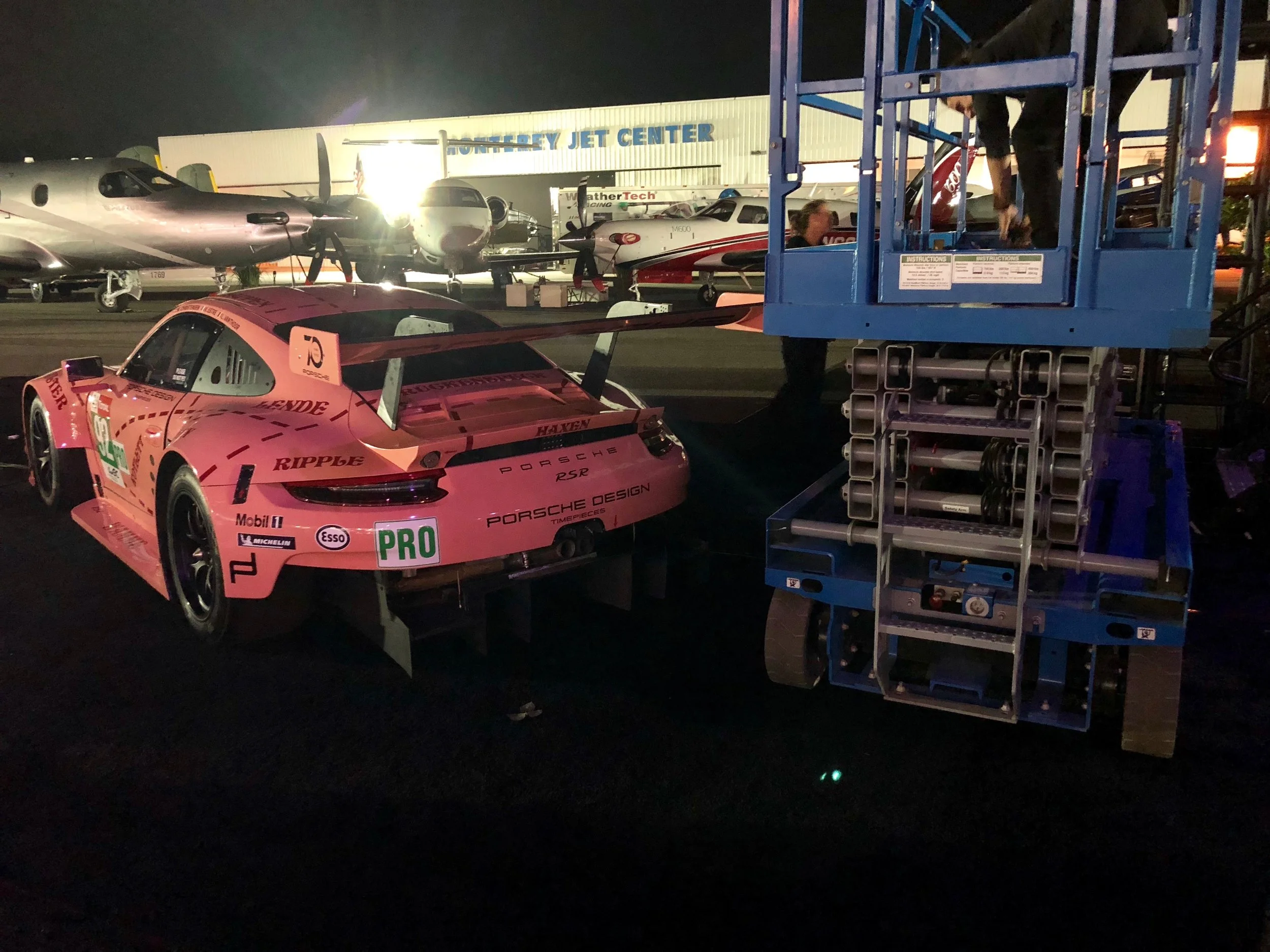 Driving a scissor lift inches away from a Le Mans winning car.. 