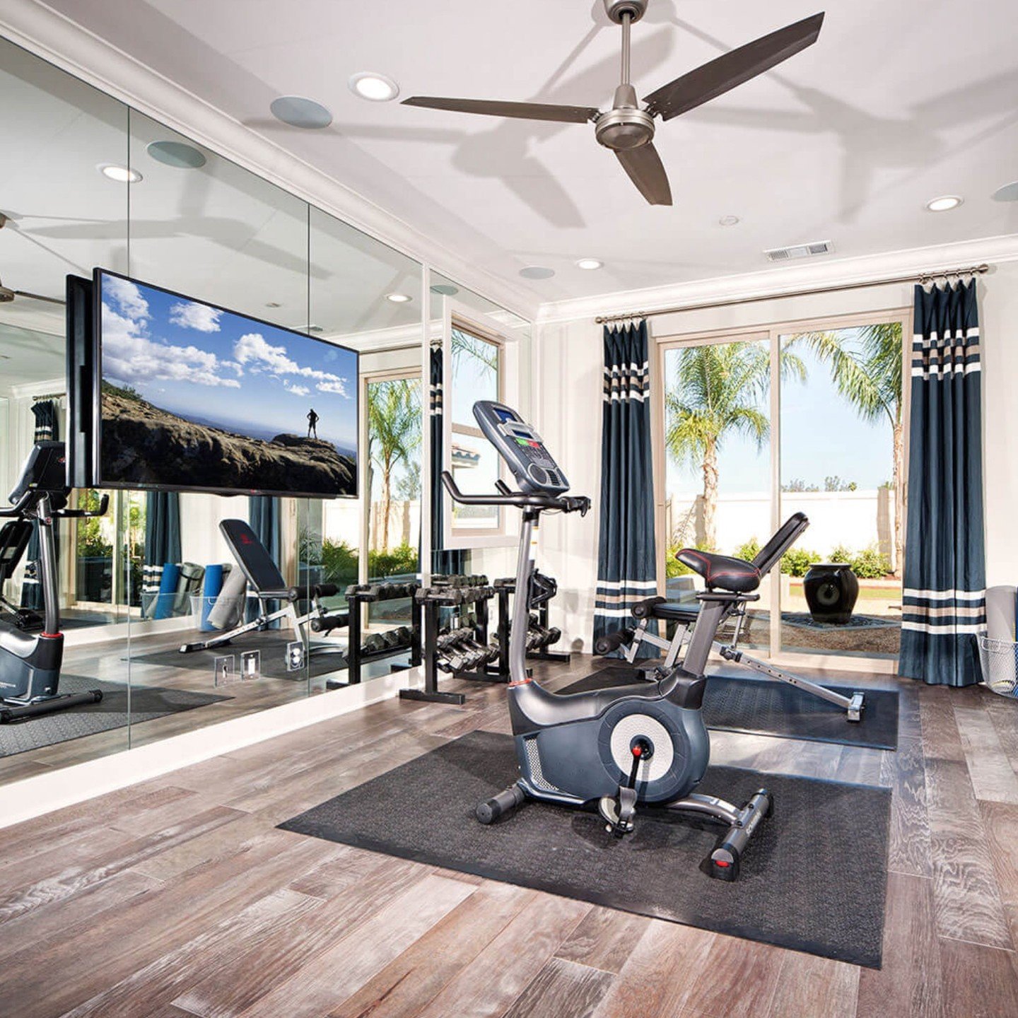 🌟 Integrating a TV into your Mirrored Wall 🌟 
Ever thought about adding a TV to your mirrored gym wall but worried it might disrupt the sleek look? 📺✨ At Iron House Design, we've mastered the art of integrating entertainment into your workouts wit