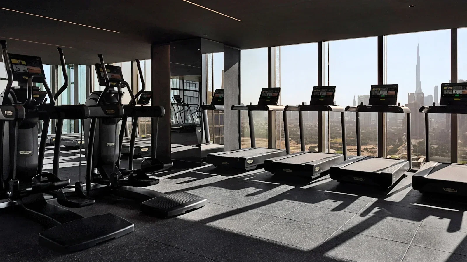 luxury-hotel-gym-overlooking-city.webp