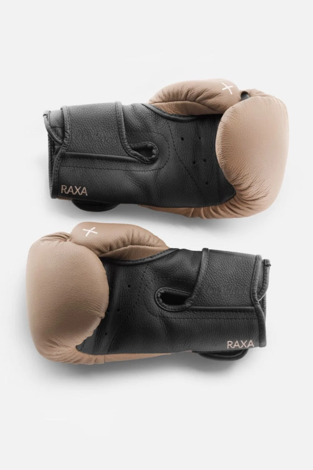 Overhead view of the PENT RAXA leather boxing gloves.