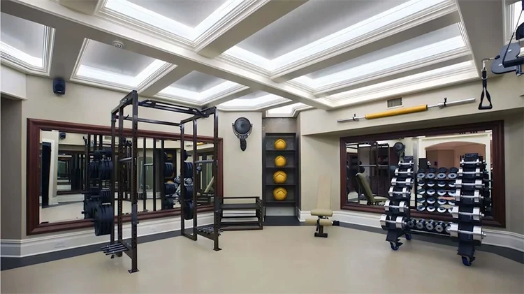 Luxury Home Gym with Coffered Ceiling
