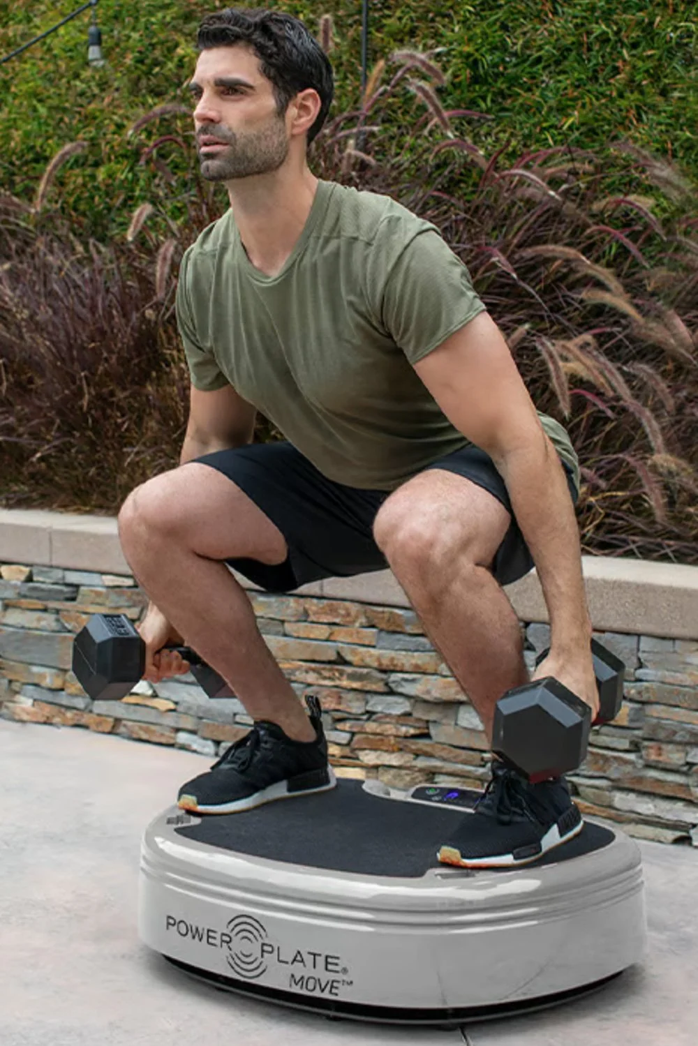 man-using-the-power-plate-move-in-silver.jpg