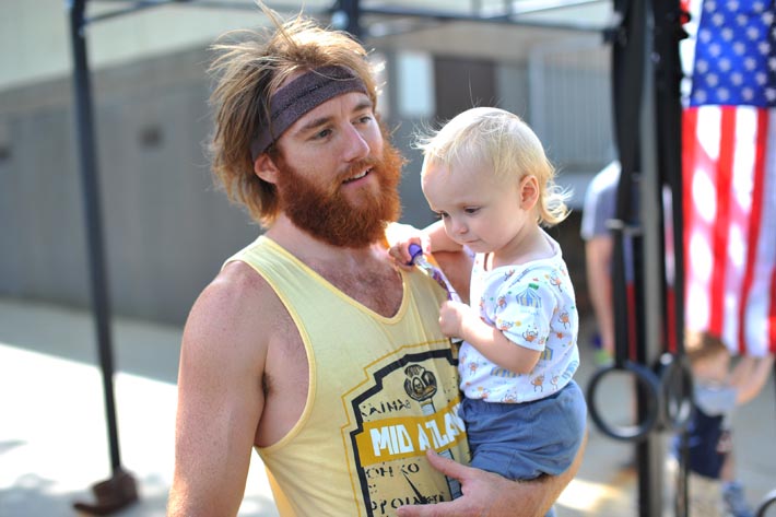 Coach Steve and his less hirsute and seriously adorable clone.