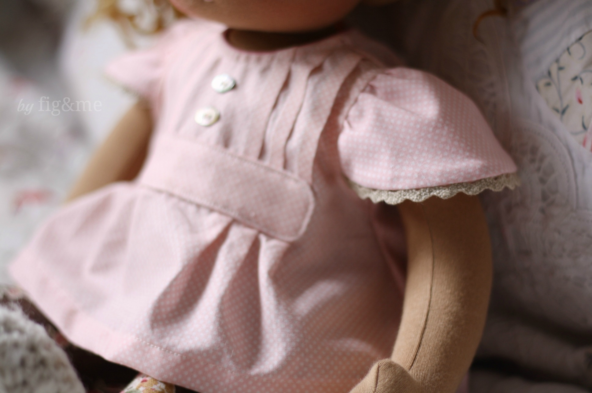 Doll blouse, with pintucks and mother of pearl buttons plus cap sleeves, by Fig and me.