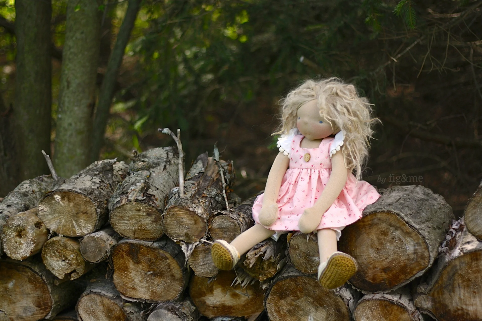 Amelie by the wood pile, by Fig and me.