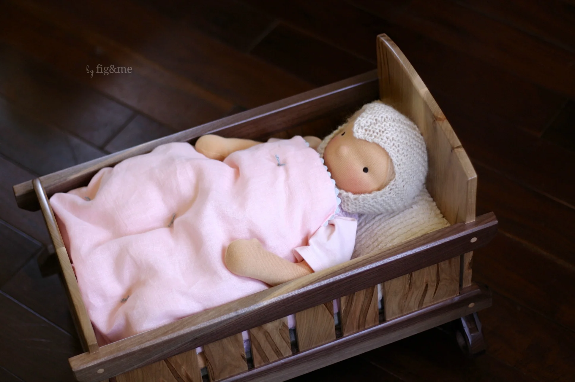Baby Lou and her wooden cradle. — fig & me