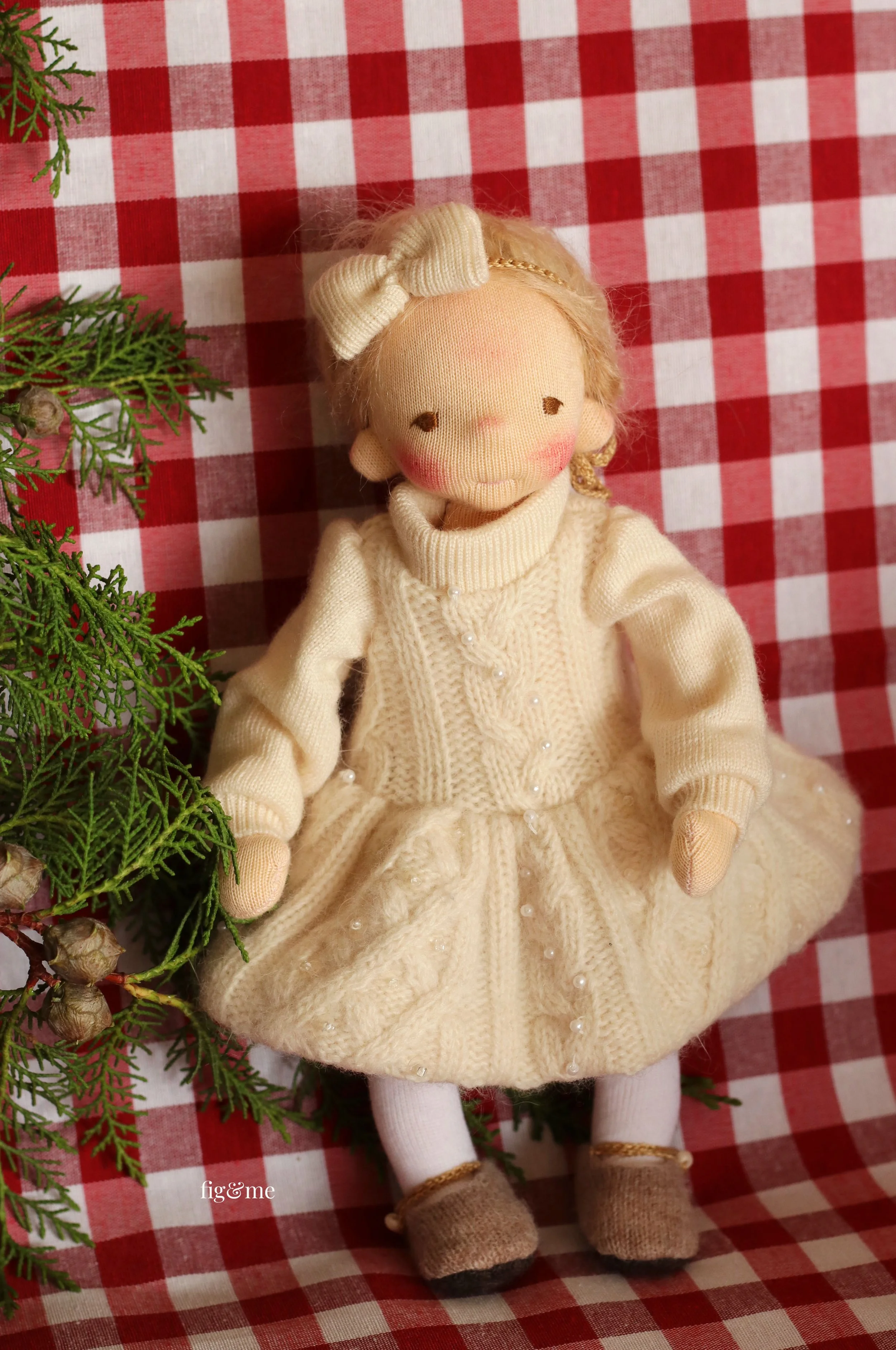 blonde waldorf inspired art doll with white cabled knit dress