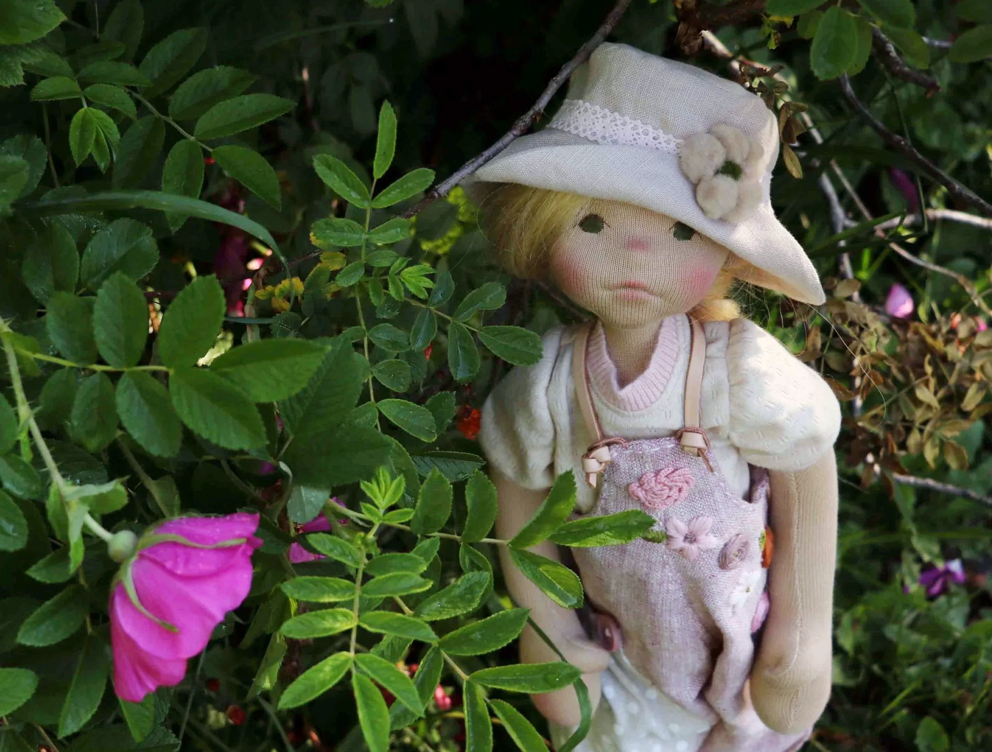 art doll journal mailing list blonde hair doll in garden with pink clothes