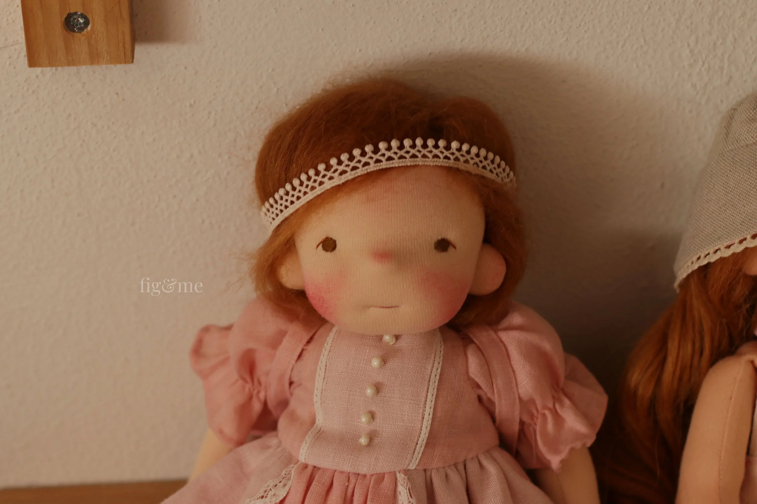 waldorf doll brunette with pink dress
