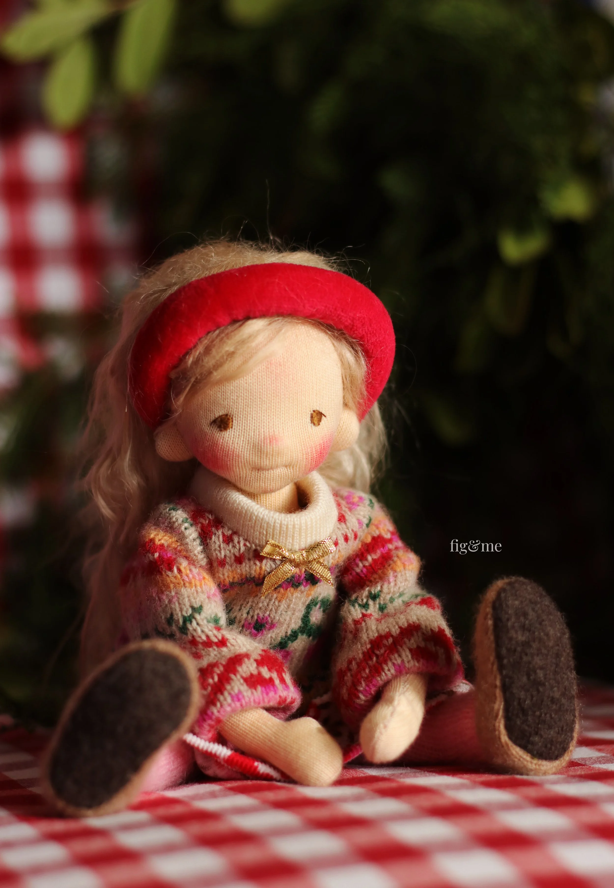 custom fiber art doll in christmas clothing