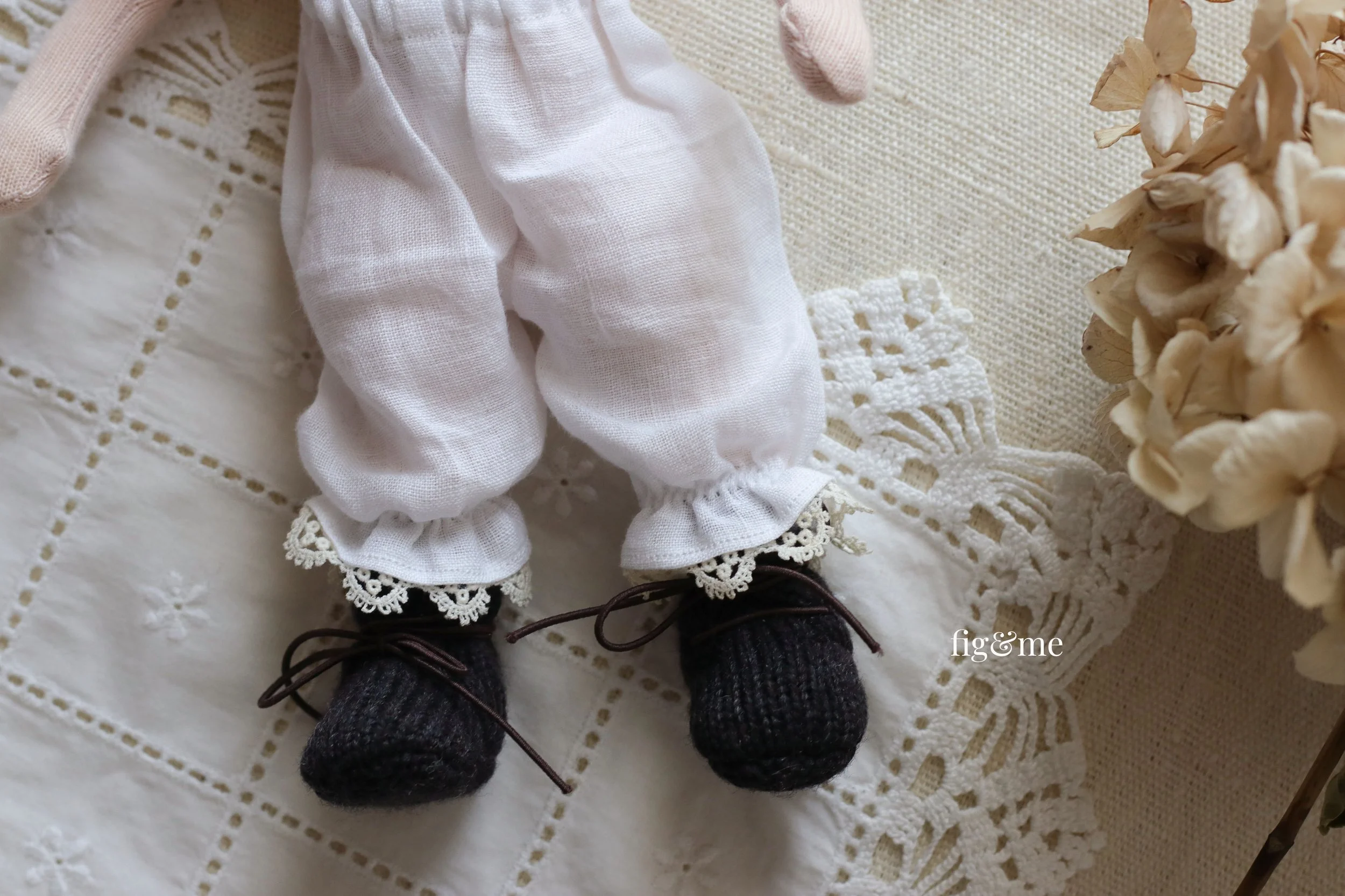 doll linen bloomers with lace edging and black wool boots