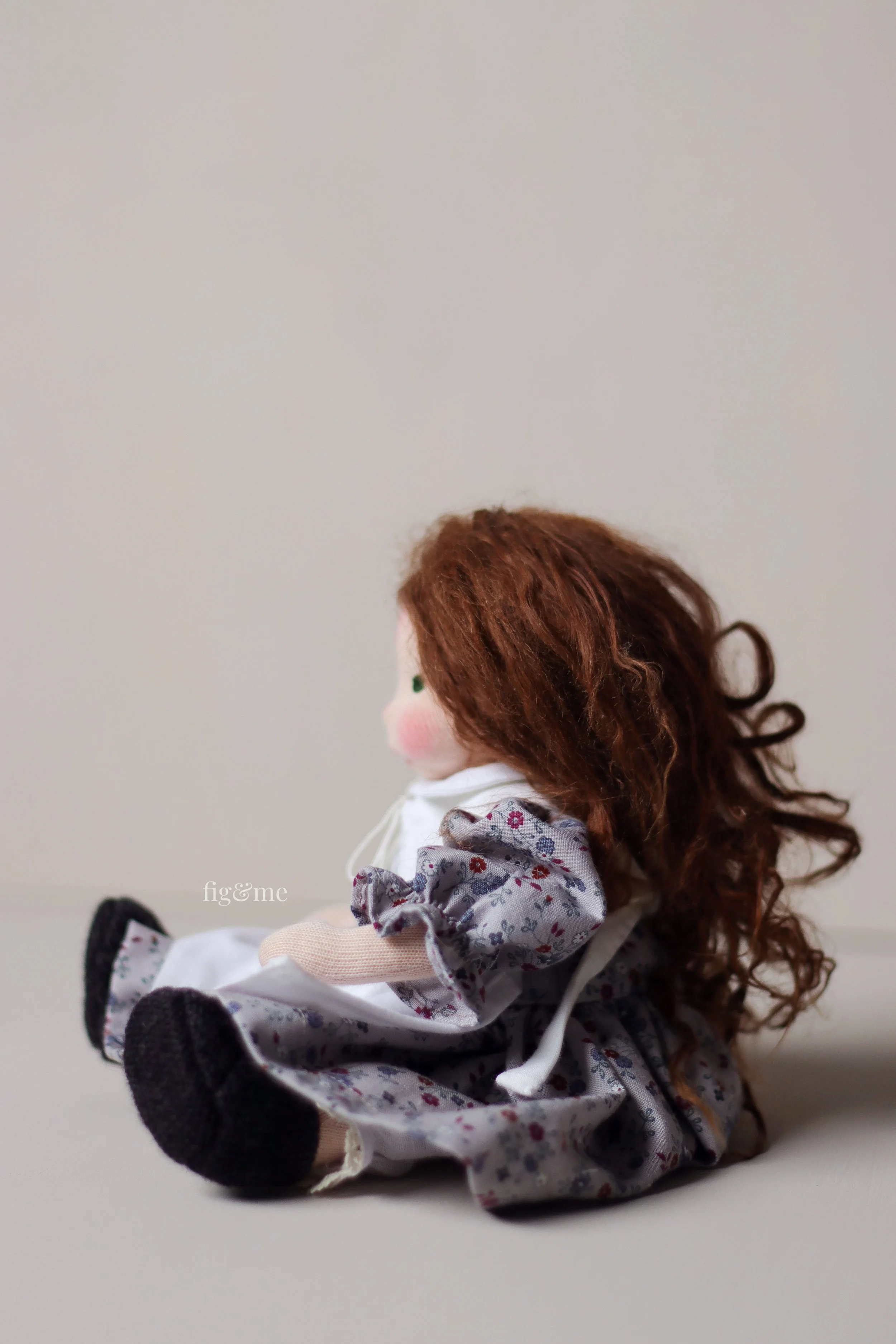 natural fiber art doll, sitting down, wearing heirloom style clothing
