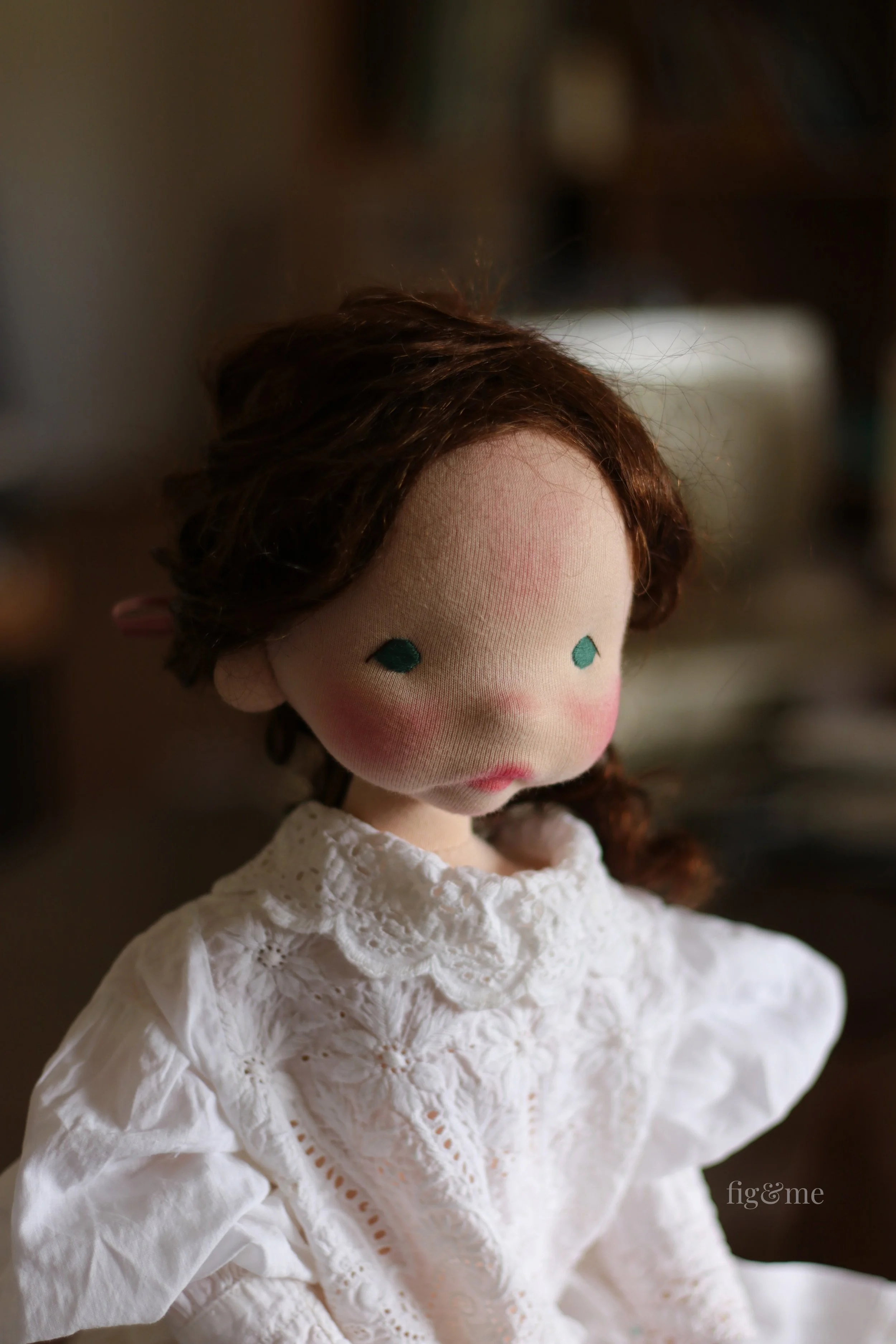 antique clothing on natural fiber art doll