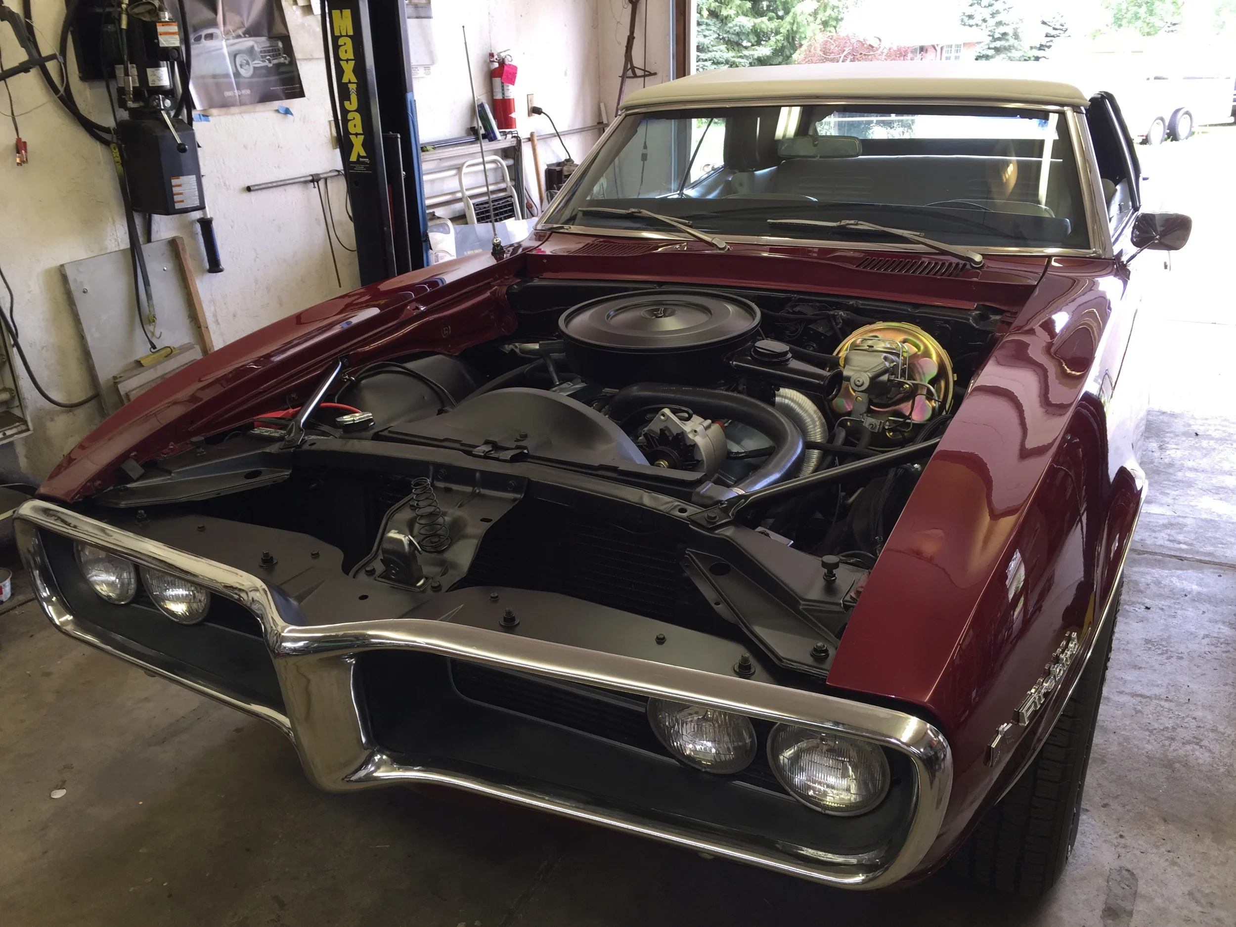 Engine bay freshened up with a freshly rebuilt 350, rebuilt carb and new accessories.