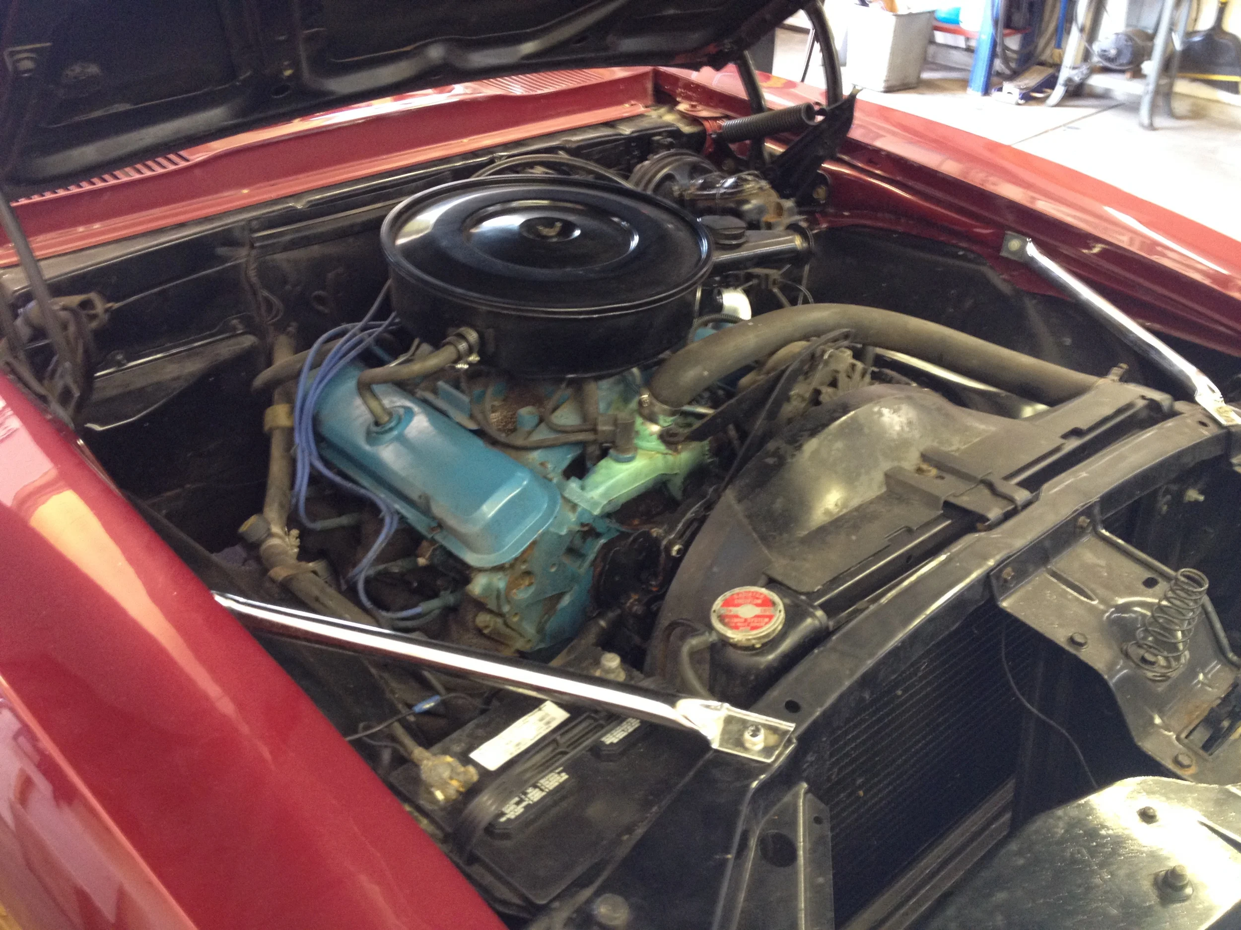 All original Pontiac 350. Original engine bay not too bad.