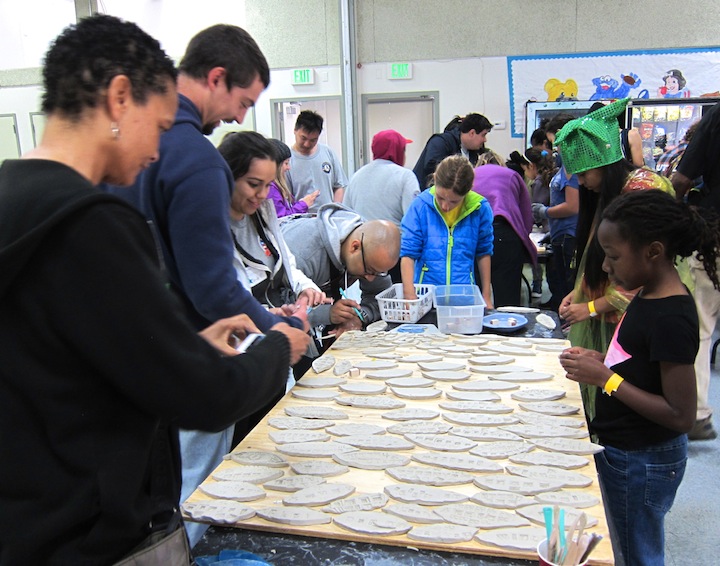 Participants making tiles