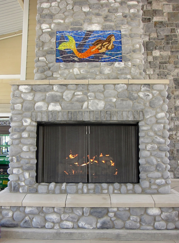Installed on the enormous fireplace at the center of the mall.
