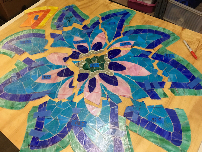 Cutting the flower sections to fit in the carry ons. The sections had to be so small!