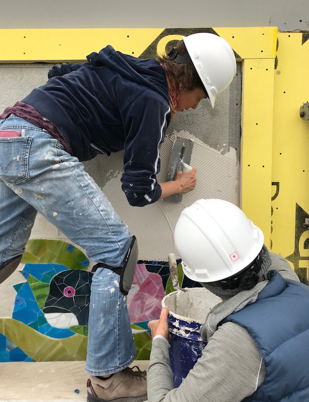 Rachel trowels as the whole team works in high gear getting the sections up.