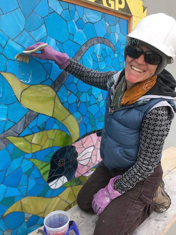 Carol seals the grout. We switched to cellulose sponges very quickly
