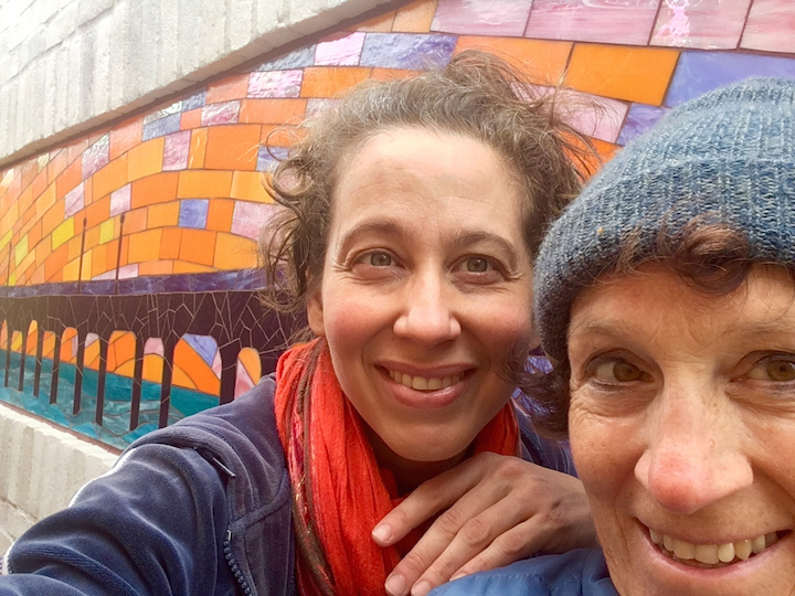 Rachel and Carol Bevilacqua installing the Pier Mural in Manhattan Beach