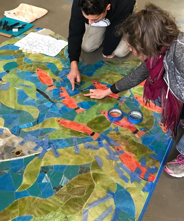 Jesse Medina and Rachel figure out how the seams connect.