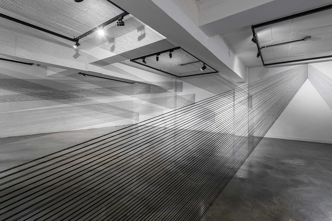 05.EunHyeKang_Hidden-Space_Cotton-yarn_Site-specific-installation_2017.jpg