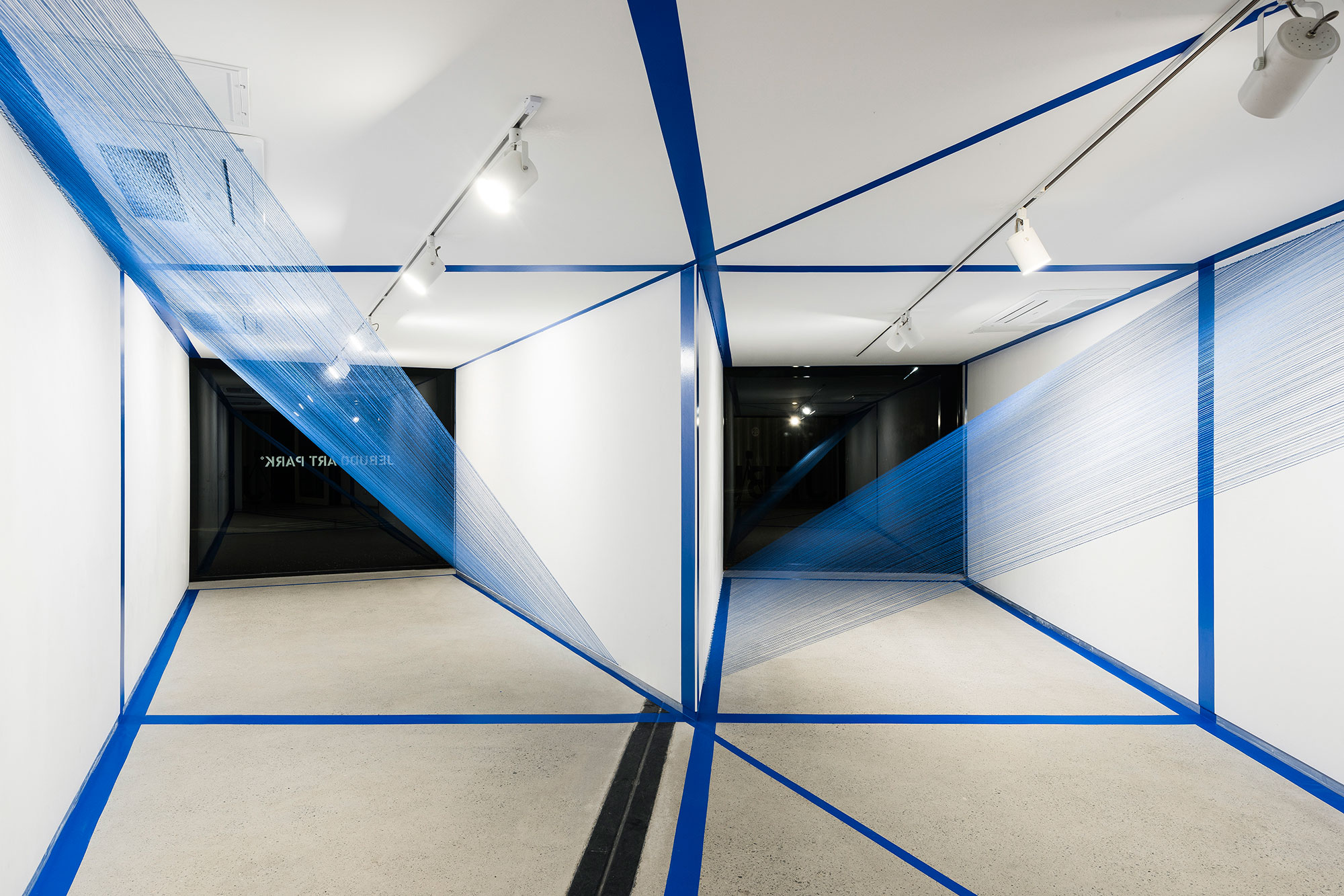 2.EunHyeKang_Gestalt_Tape,-Cotton-yarn_Site-specific-installation_2018.jpg