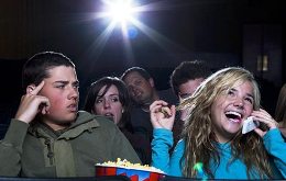Sure, she might be interrupting your viewing experience, but think about the guy on the date with her. This is not a good sign for him at all. (photo from isanythingworse.blogspot.com)