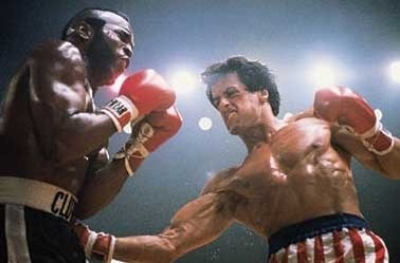 Watching the Rocky franchise can be like watching the evolving ideal for male physicality. Compare him here to him in Rocky 2. Note the physique changes, the loss of body hair, etc etc. Anyway, the other guy's name is Clubber Lang. (photo from amazon.com)