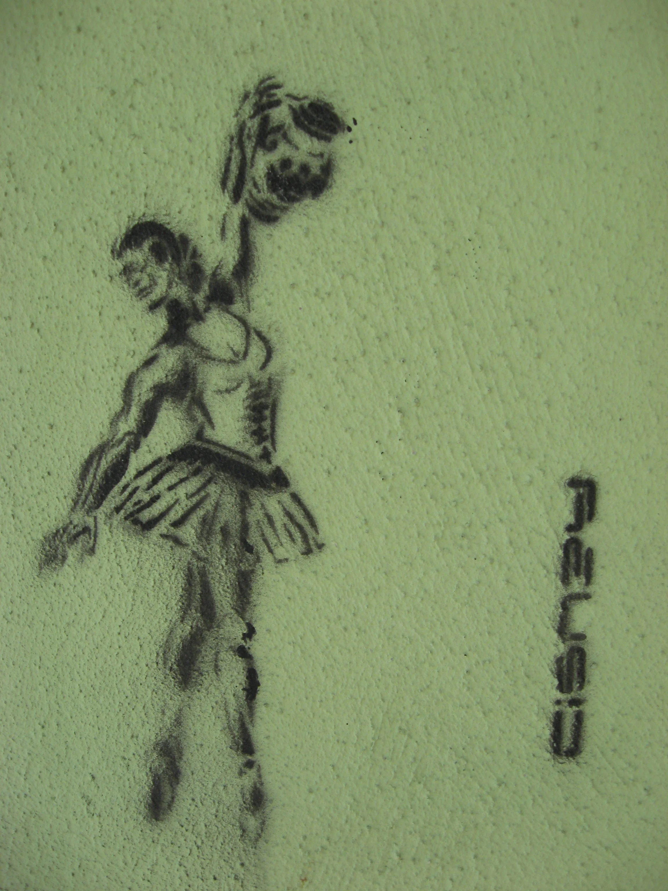 Title "Dancer." This stencil was applied to walls in various locations around the city centre. I liked the feminine / masculine duality of the image. 