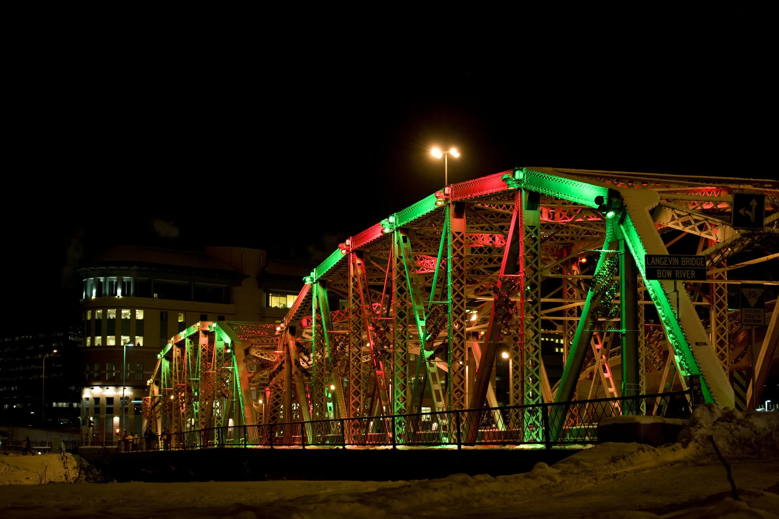 In 2009, Calgary Municipal Land Corporation, installed a state of the art LED lighting system on the 110 year old Langevin Bridge which is the gateway into the downtown for many visitors to city from the airport. The lights can be programmed in an infinite number of ways to celebrate various holidays and special events. The total energy consumption per year is the equivalent of about 3 homes. Photo credit: CMLC