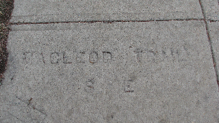 This Macleod Trail stamp in Ramsay dates from the time when Macleod Trail followed the road that became Spiller Road.