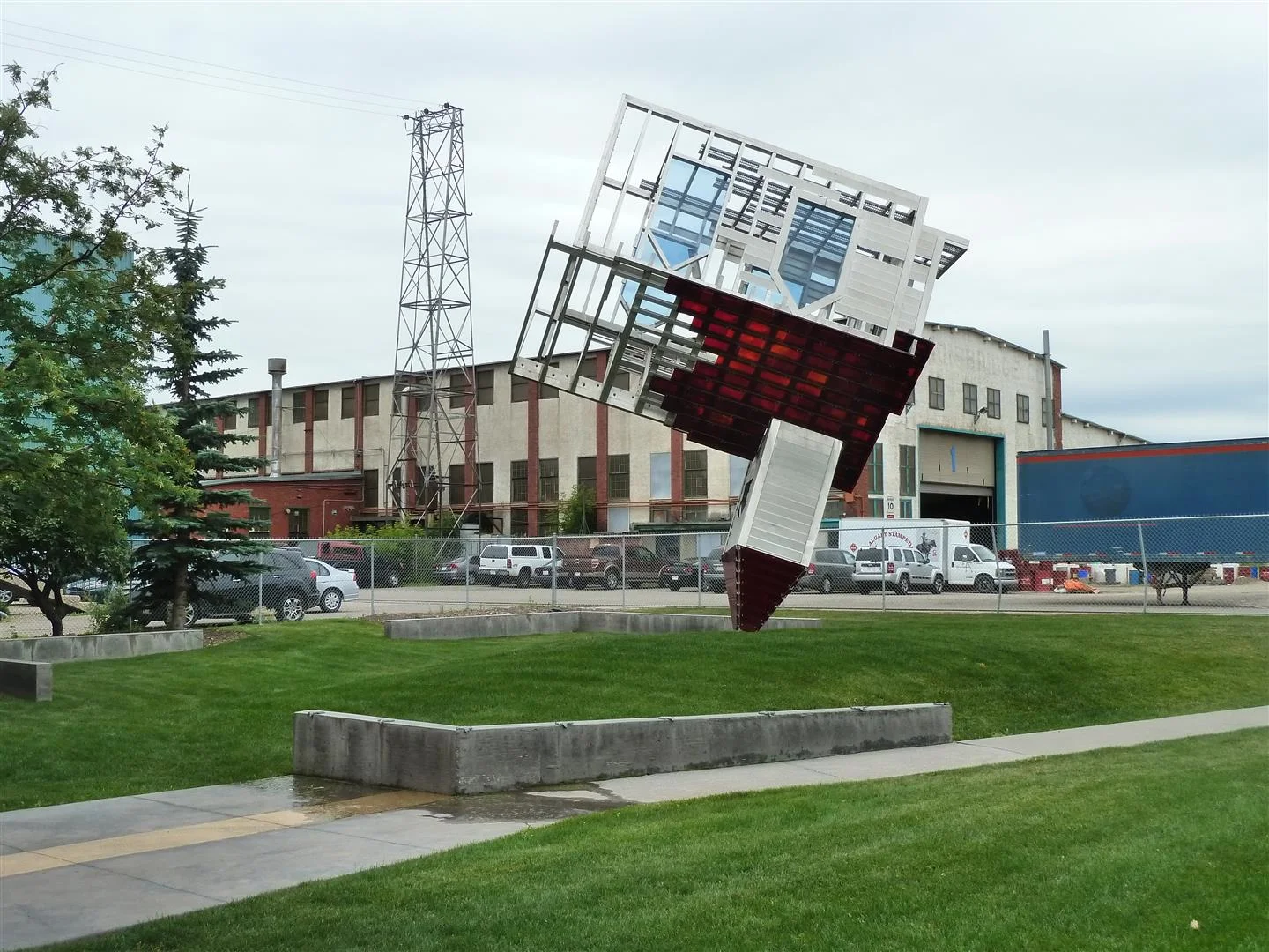"Device to Root Out Evil" was created by Dennis Oppenheim in 1997. It is a compelling 6 meter tall glass, steel and aluminum sculpture on loan to the Glenbow Museum from Vancouver's Benefic Foundation.