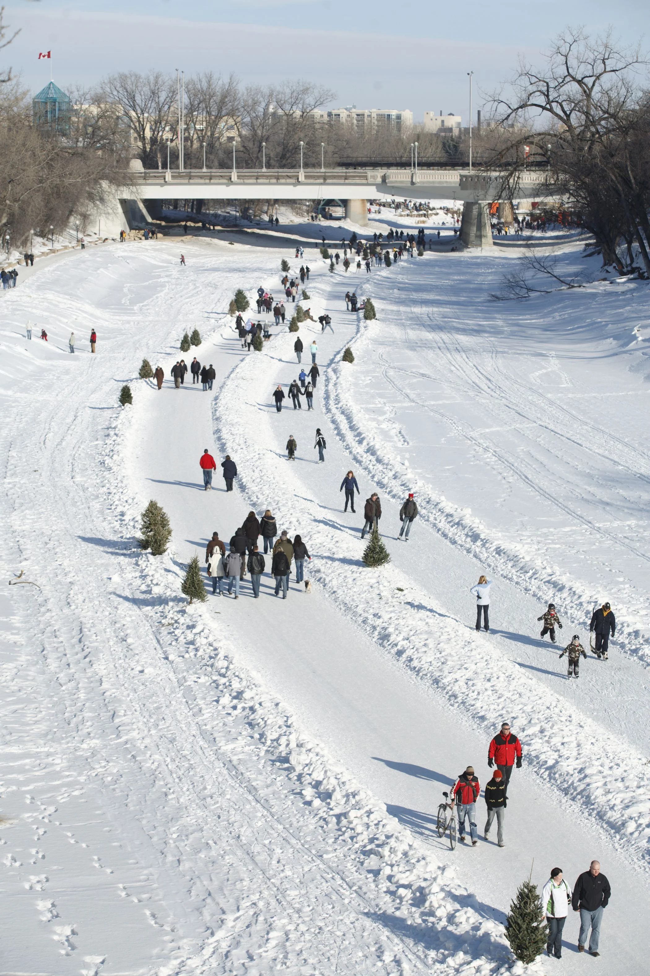 Thousands of people enjoy the world's longest skating rink in Winnipeg. Perhaps Calgary could convert some if its pathway system into a skating trail. (photo courtesy of Tourism Winnipeg) 