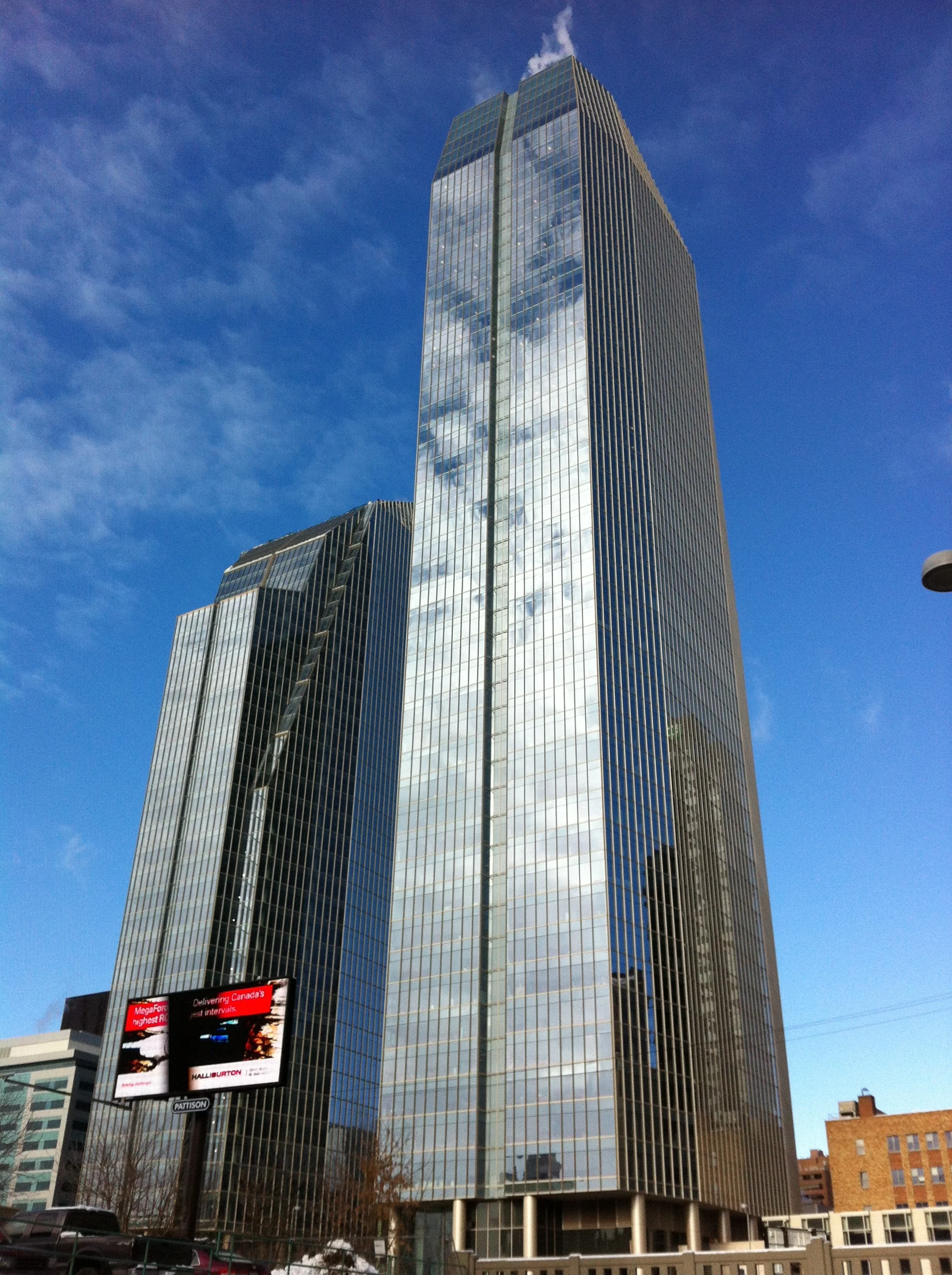 The unique design for Eight Avenue Place was inspired by the Canadian Rockies with their jagged, angular, shard-like peaks. The building's facade reflects Calgary's abundant sunshine at several different angles during the day and seasons creating an ever-changing facade. 
