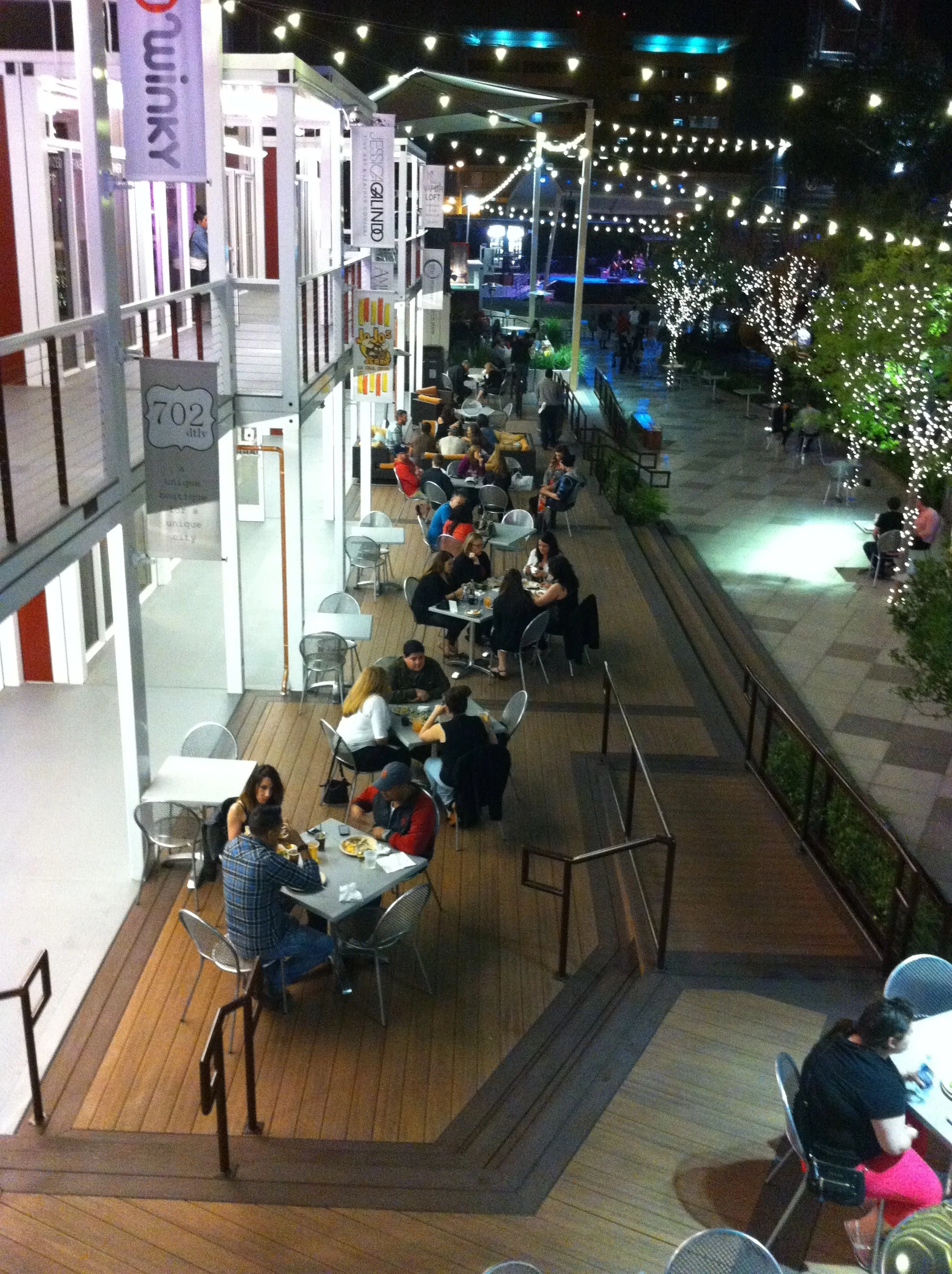 Once inside it is a place to dine, have a drink and hang out with friends. &nbsp;It is like a patio or back deck party.&nbsp;