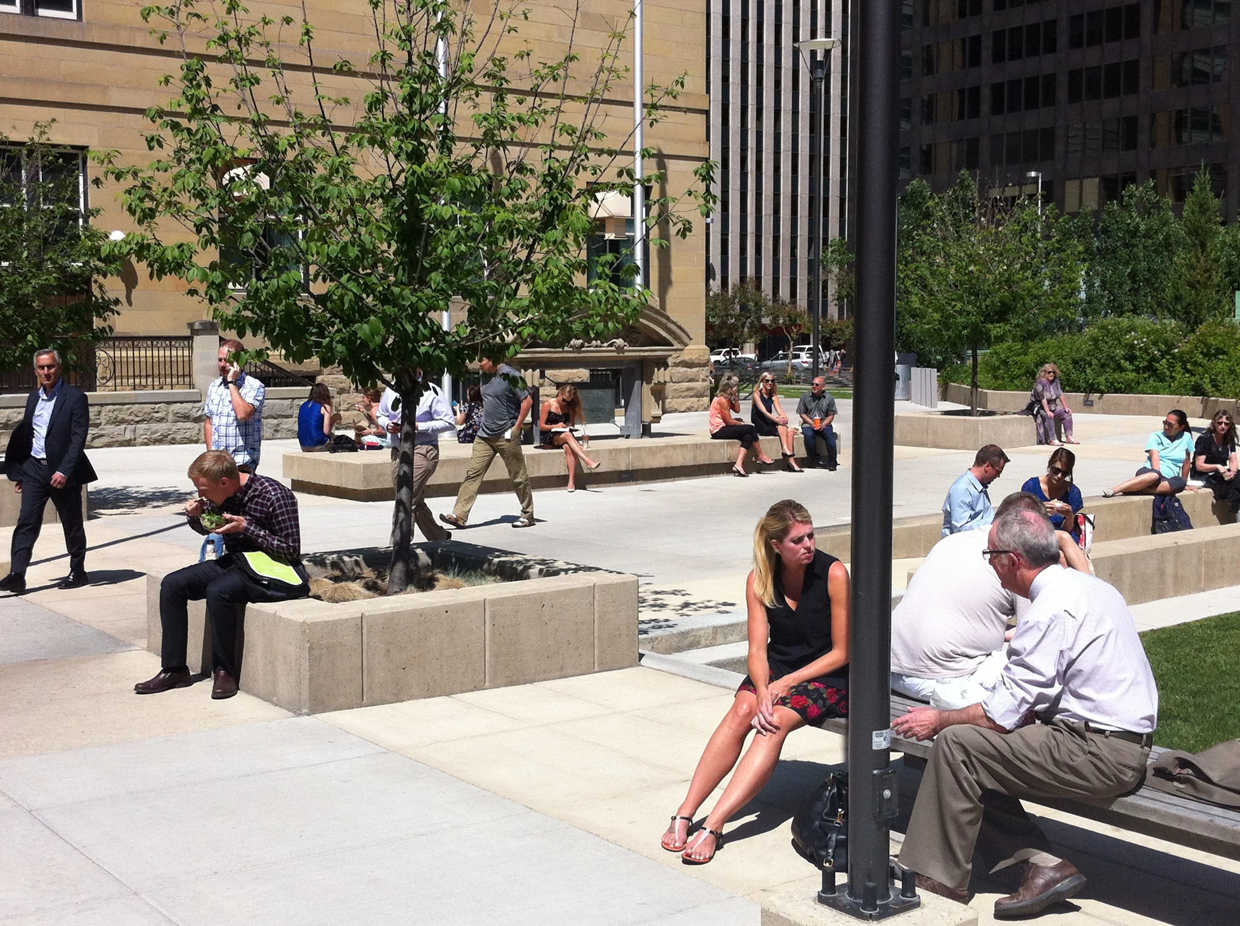 The Harley Hotchkiss Gardens is a popular meeting spot for downtown workers and shoppers. This public space is a good example of go urban design as it is built on top of a 700-stall parking garage, includes a major public artwork, has lots of seating and is directly linked to an LRT station. 