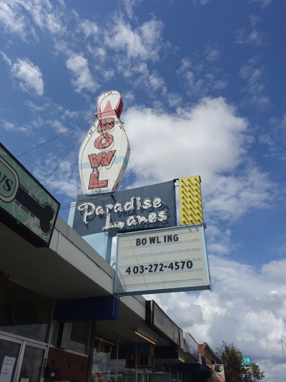 There are also several great neon signs along International Avenue. Love that this one has a phone number not a website address - how retro is that?